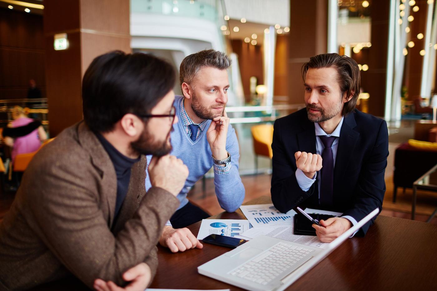 Business professionals discussing local business growth